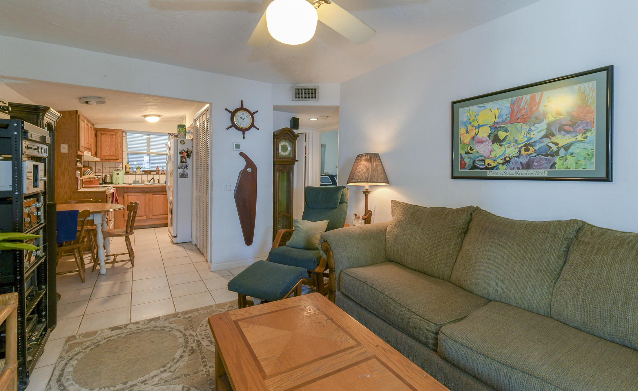 186 Harborview Drive Tavernier, FL 33070 - Photo 21 of 32 a living room with furniture and a flat screen tv