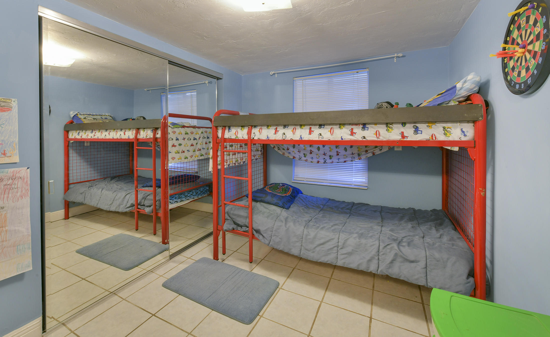 186 Harborview Drive Tavernier, FL 33070 - Photo 22 of 32 a bedroom with a bed and a table