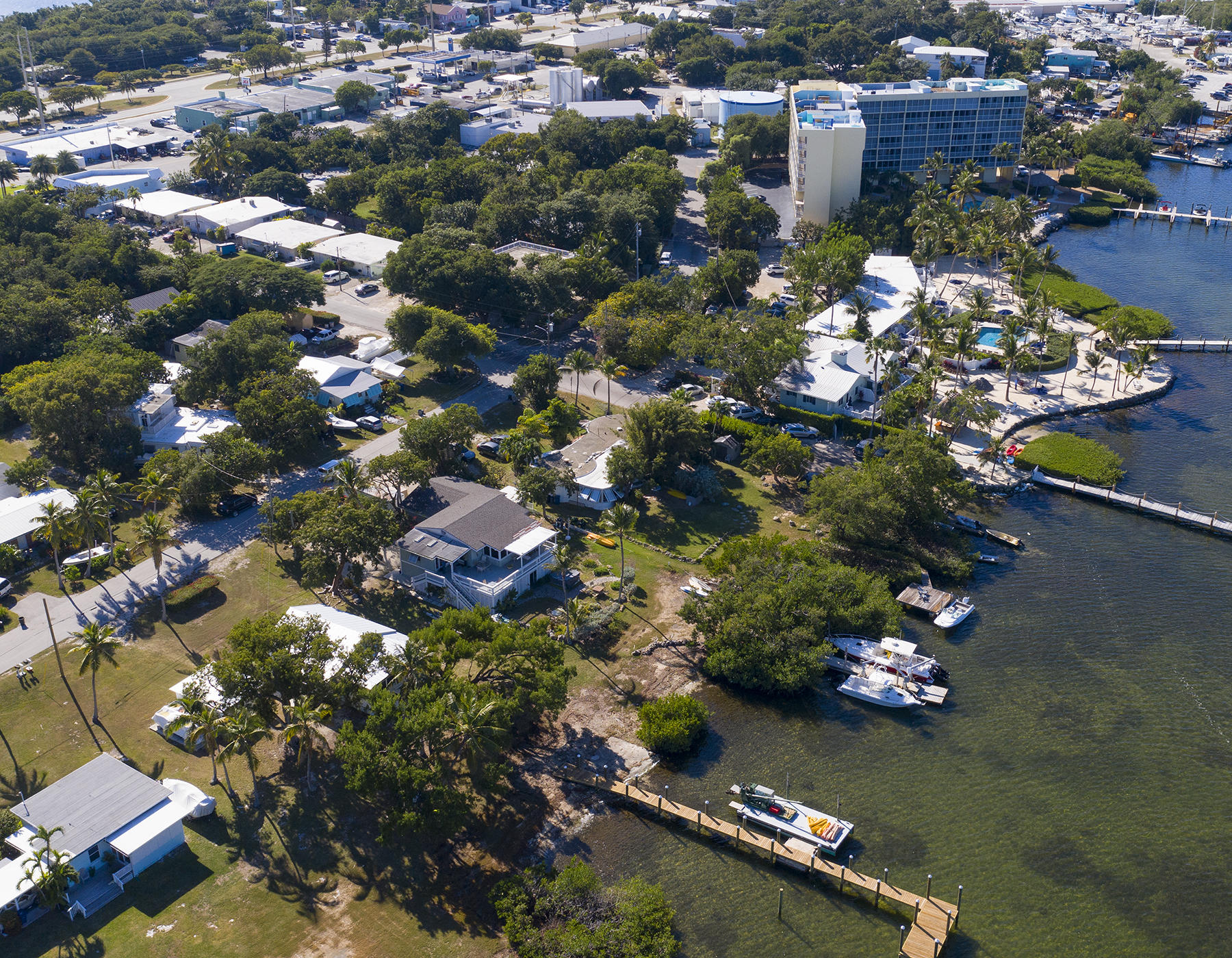 186 Harborview Drive Tavernier, FL 33070 - Photo 28 of 32 an aerial view of residential houses with outdoor space and swimming pool