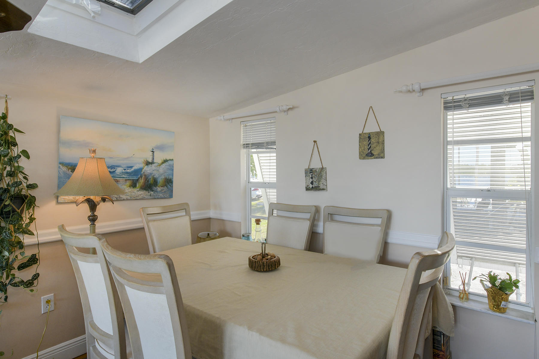 186 Harborview Drive Tavernier, FL 33070 - Photo 10 of 32 a view of a dining room with furniture and window