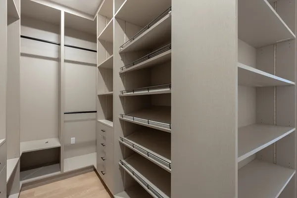 a view of an empty walk in closet