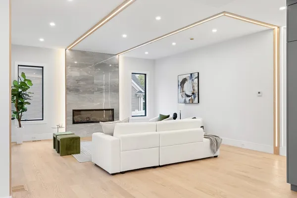 a spacious bedroom with a bed and a couch