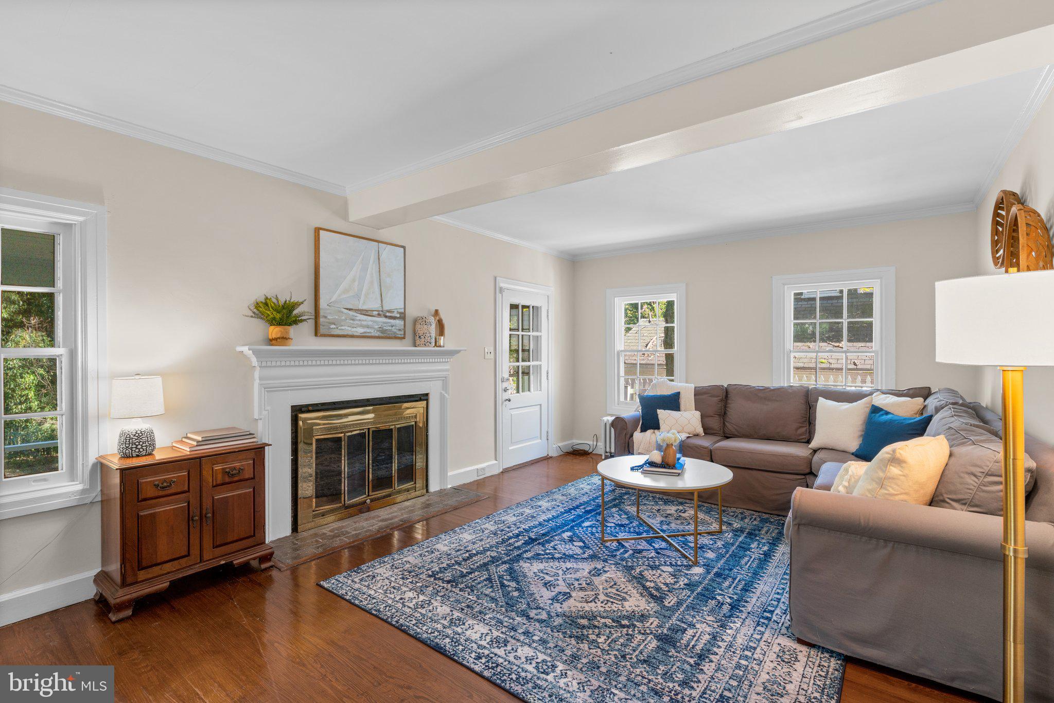 2505 Pickwick Road Baltimore, MD 21207 - Photo 7 of 48 Spacious LR w/wood burning FP, access to porch