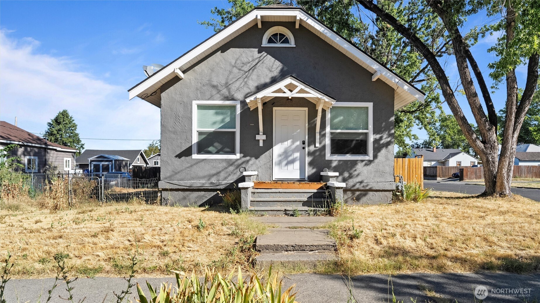 a front view of a house with swimming pool