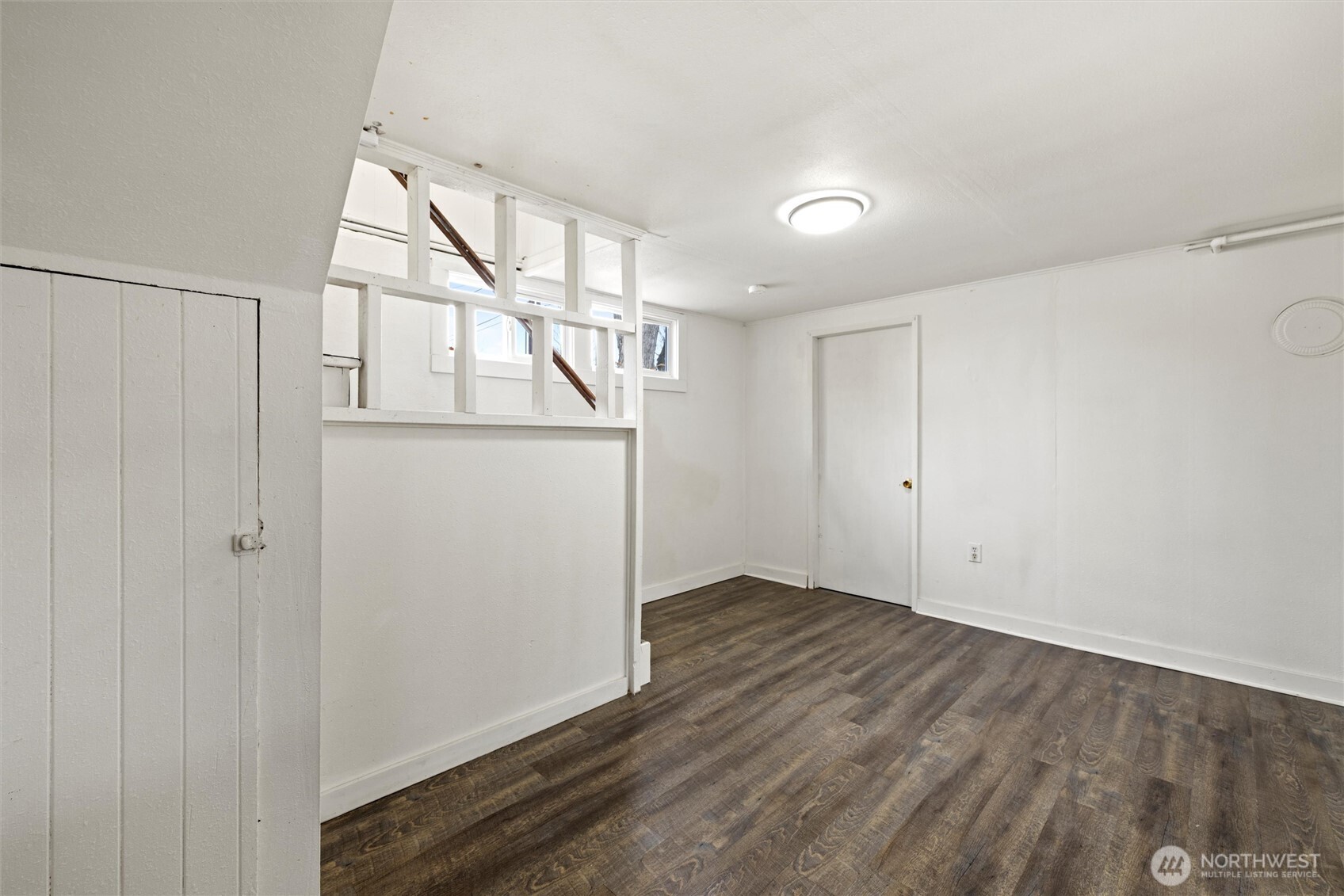 902 Emma Street Walla Walla, WA 99362 - Photo 11 of 29 a view of an empty room with wooden floor