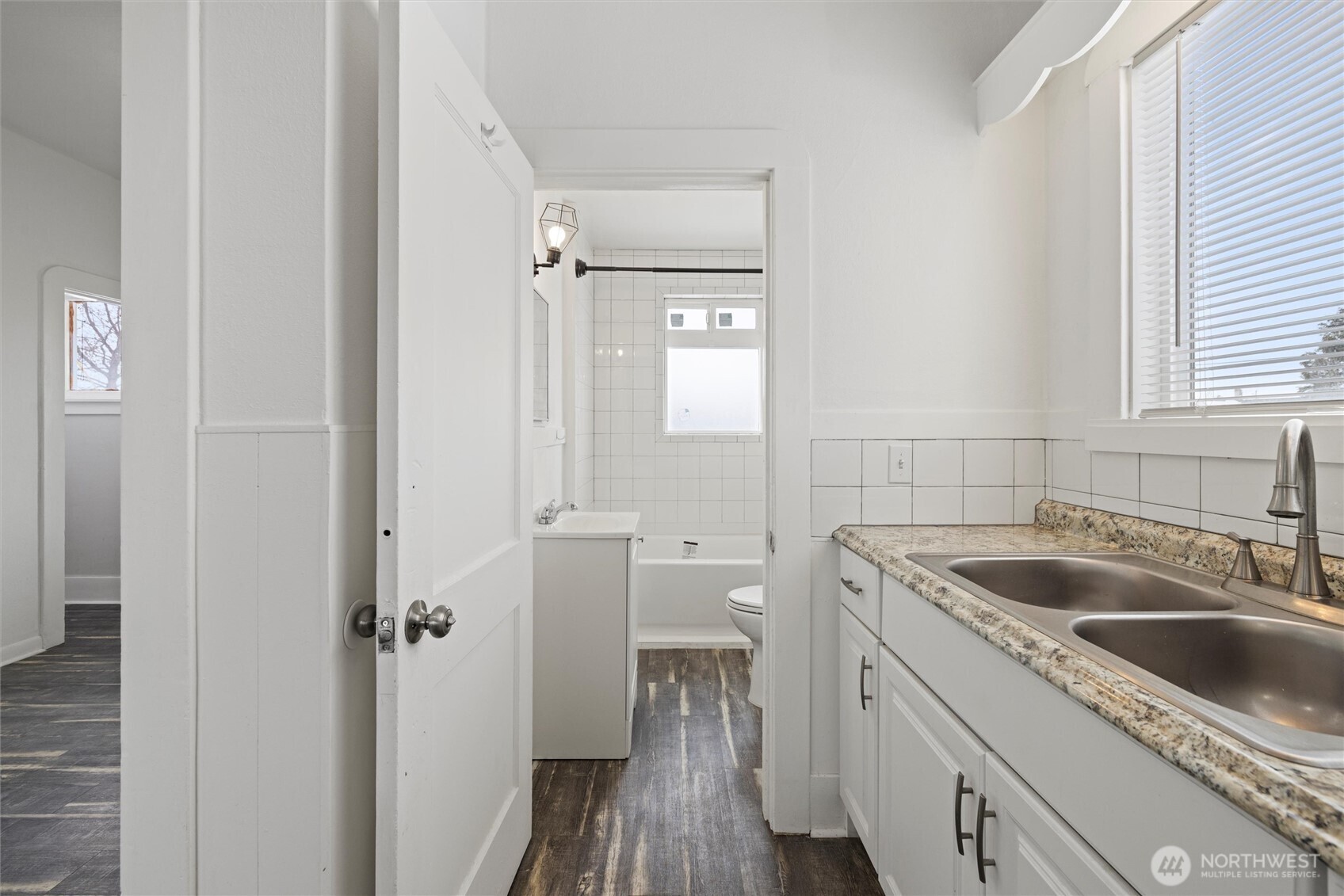 902 Emma Street Walla Walla, WA 99362 - Photo 19 of 29 a kitchen with a sink and refrigerator