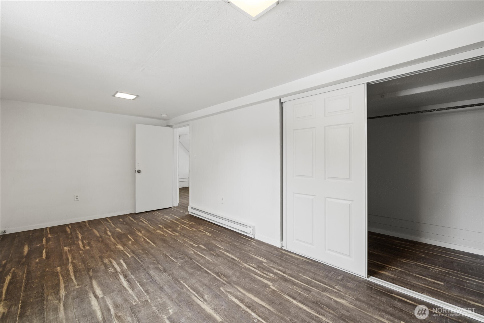 902 Emma Street Walla Walla, WA 99362 - Photo 20 of 29 a view of an empty room with wooden floor