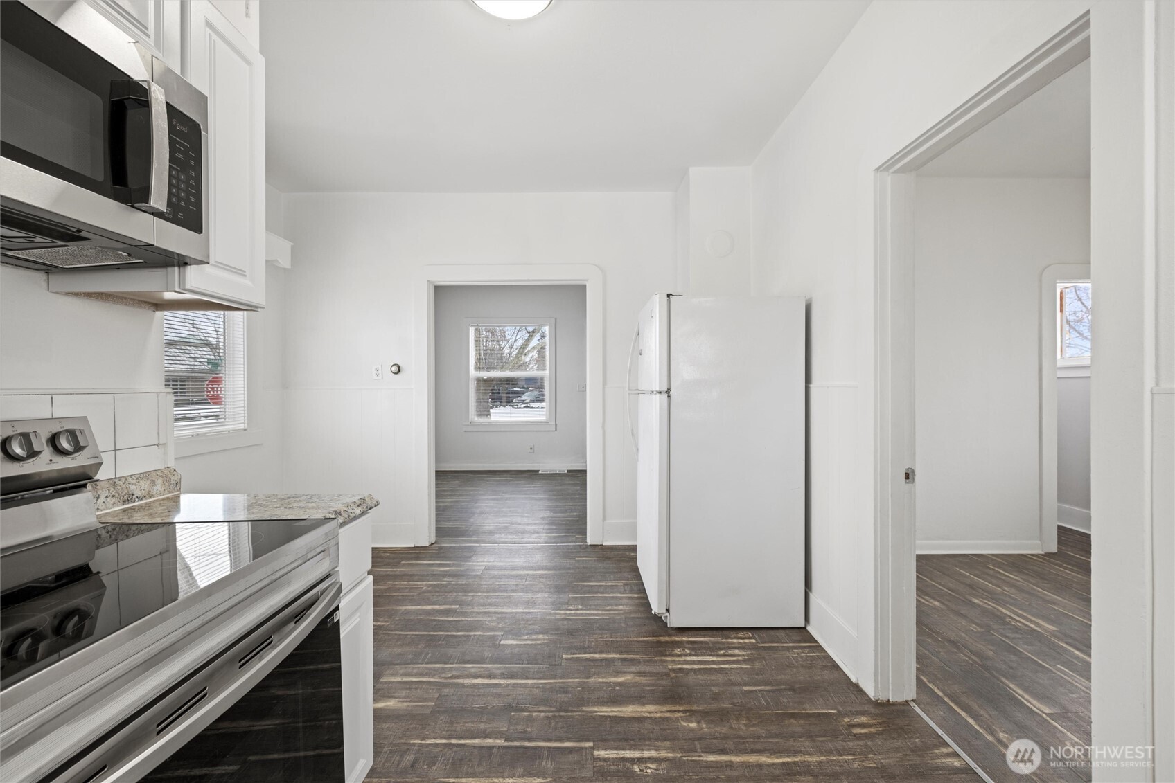 902 Emma Street Walla Walla, WA 99362 - Photo 7 of 29 a view of a kitchen from the hallway