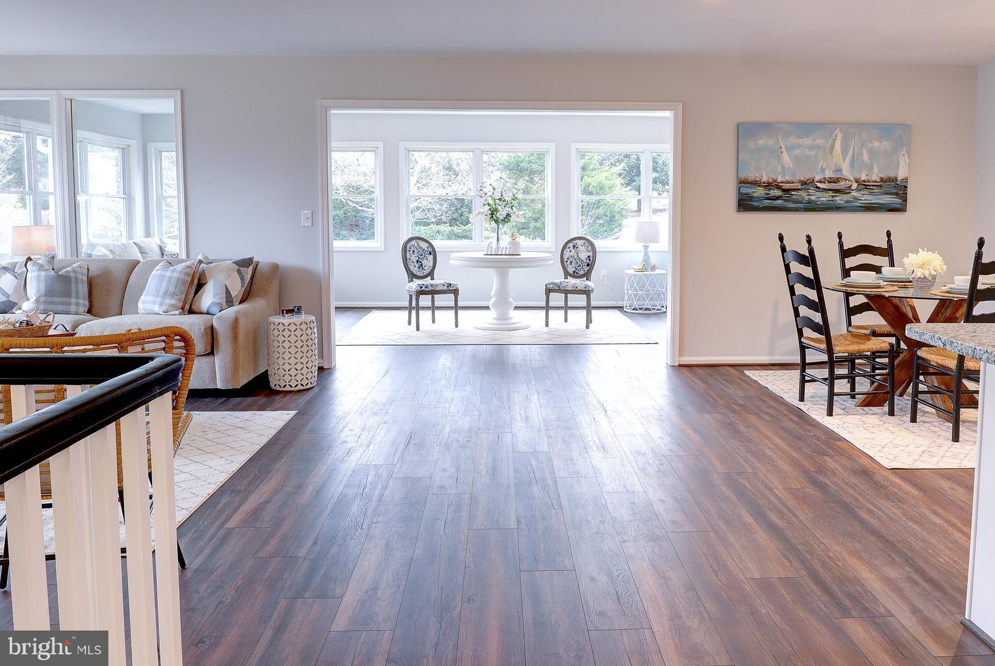 695 Hillmeade Road Edgewater, MD 21037 - Photo 5 of 28 a living room with furniture and a wooden floor