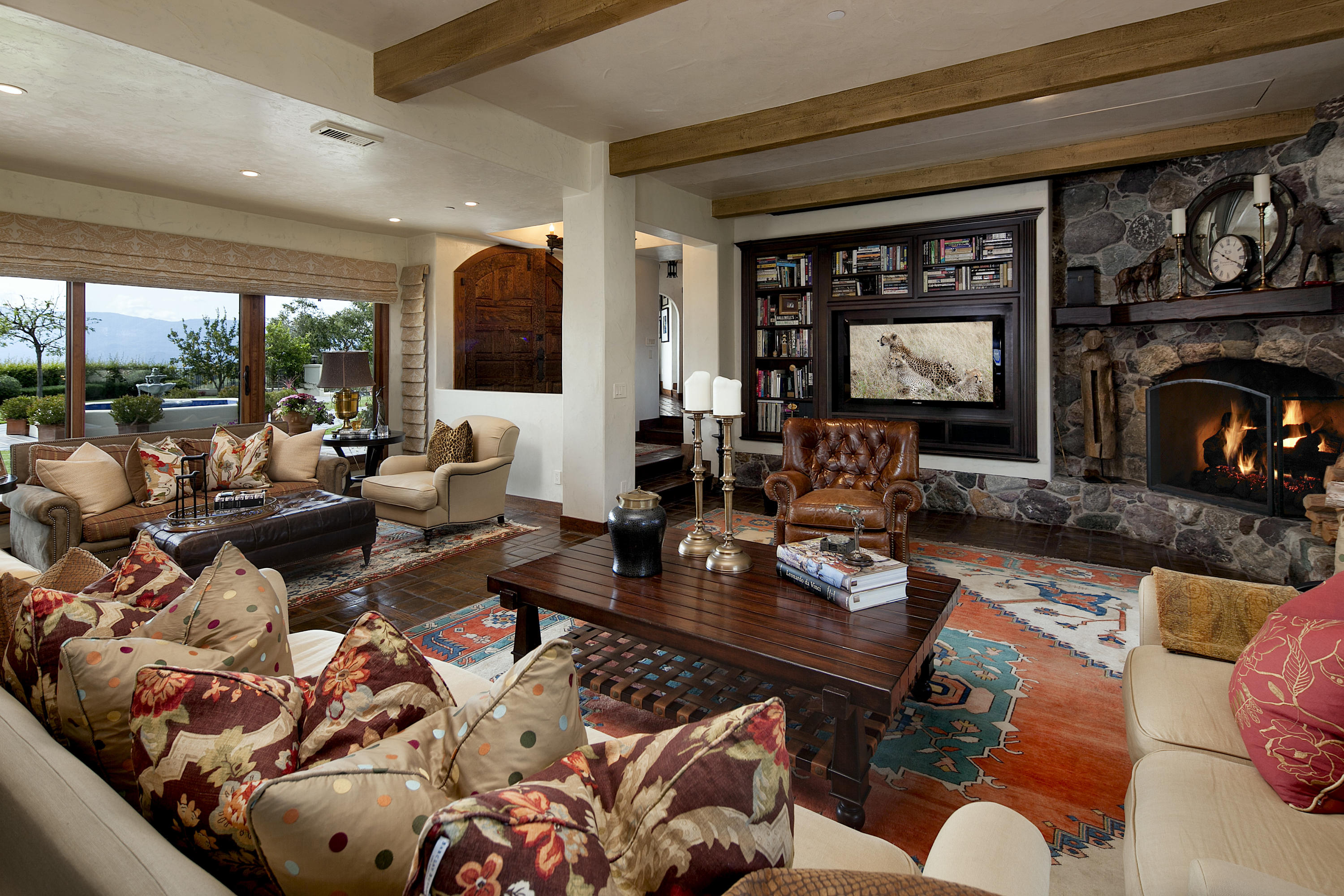2905 Roundup Road Santa Ynez, CA 93460 - Photo 15 of 34 a living room with furniture and a fireplace