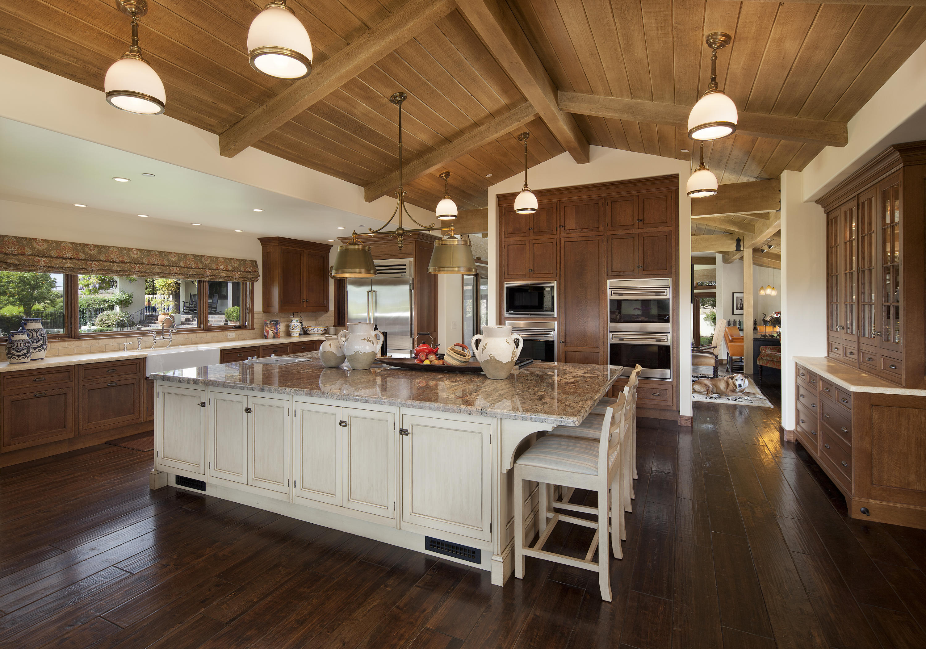 2905 Roundup Road Santa Ynez, CA 93460 - Photo 17 of 34 a large kitchen with a table and chairs