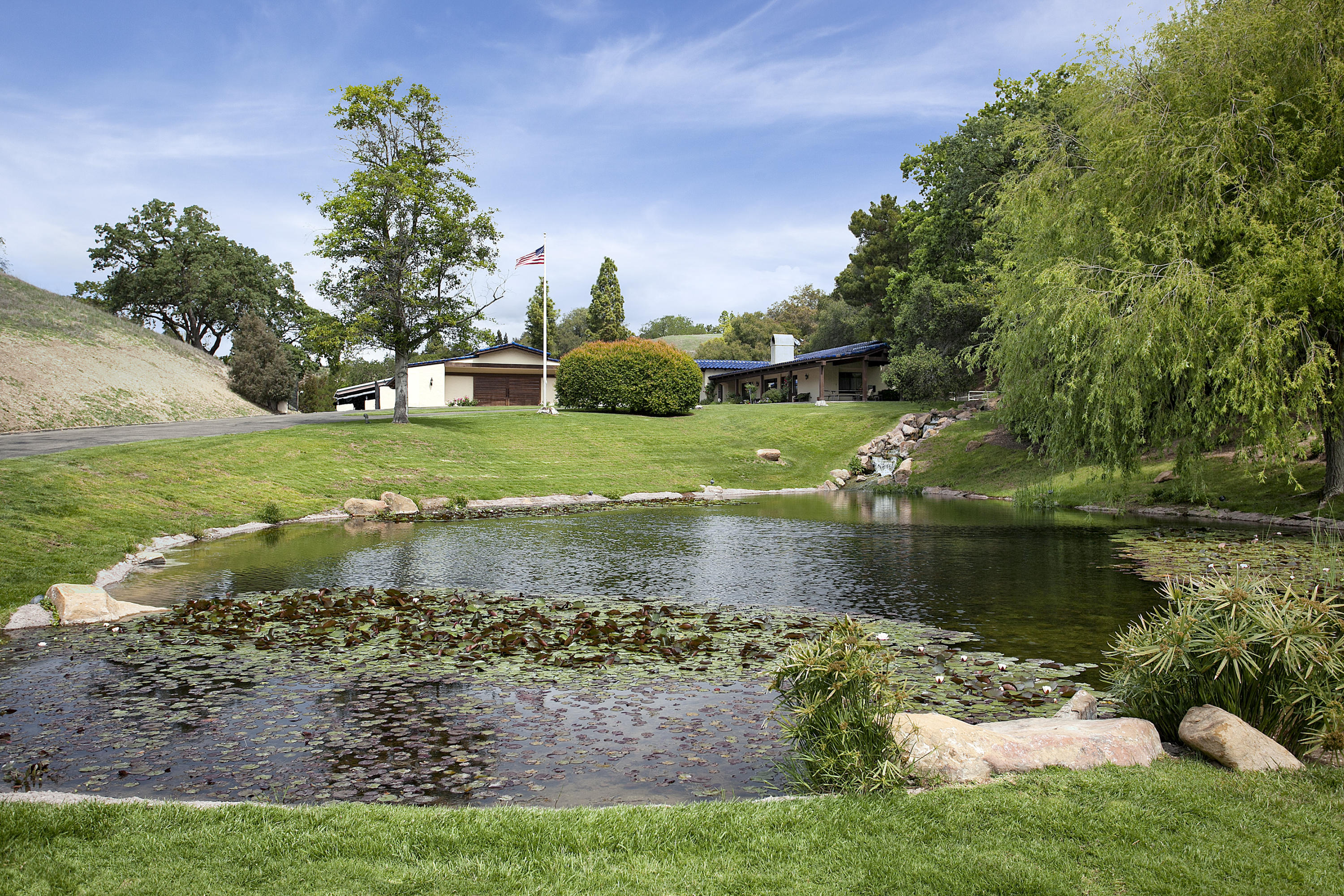 2905 Roundup Road Santa Ynez, CA 93460 - Photo 28 of 34 a view of a garden with a lake