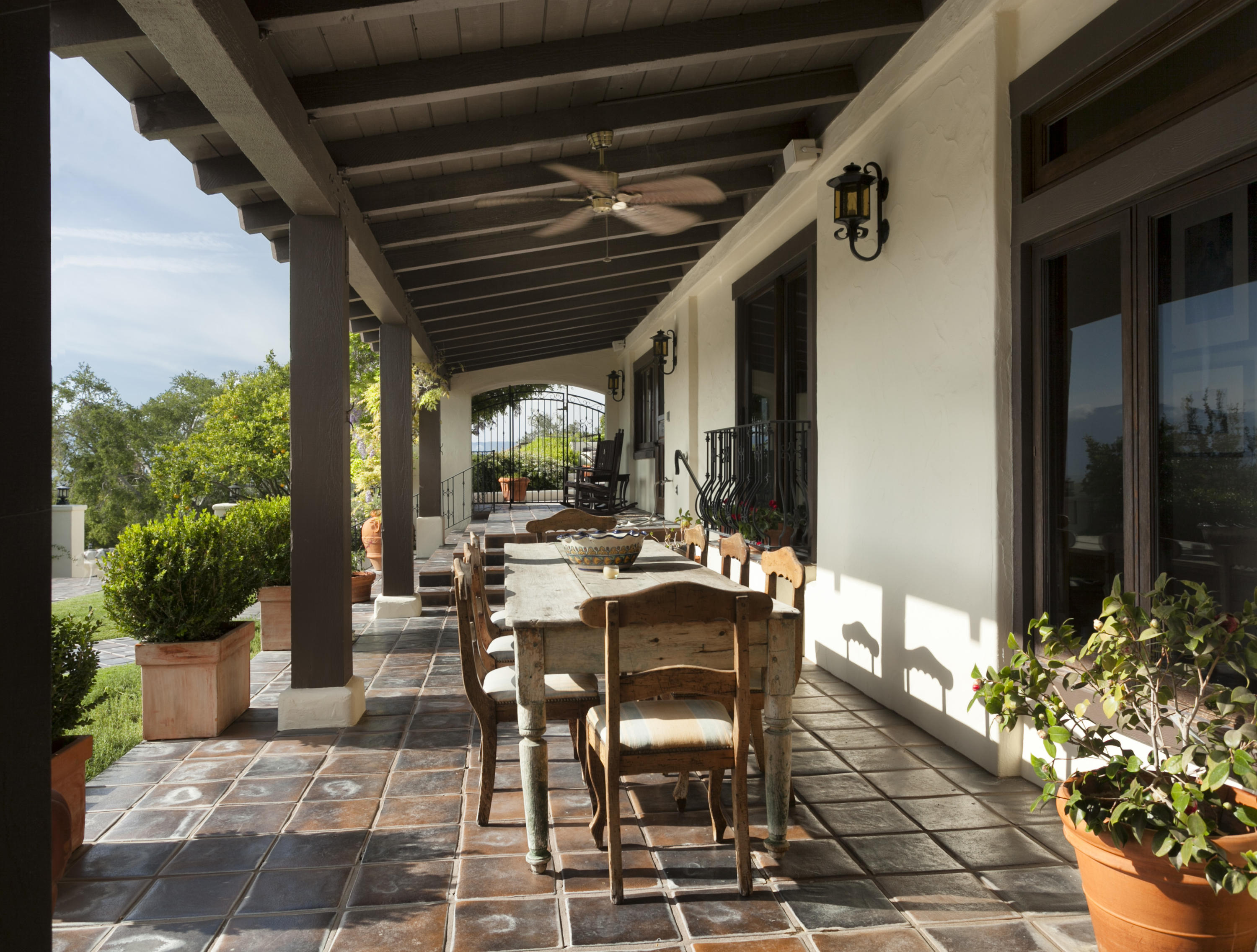 2905 Roundup Road Santa Ynez, CA 93460 - Photo 9 of 34 a view of a patio with table and chairs and potted plants