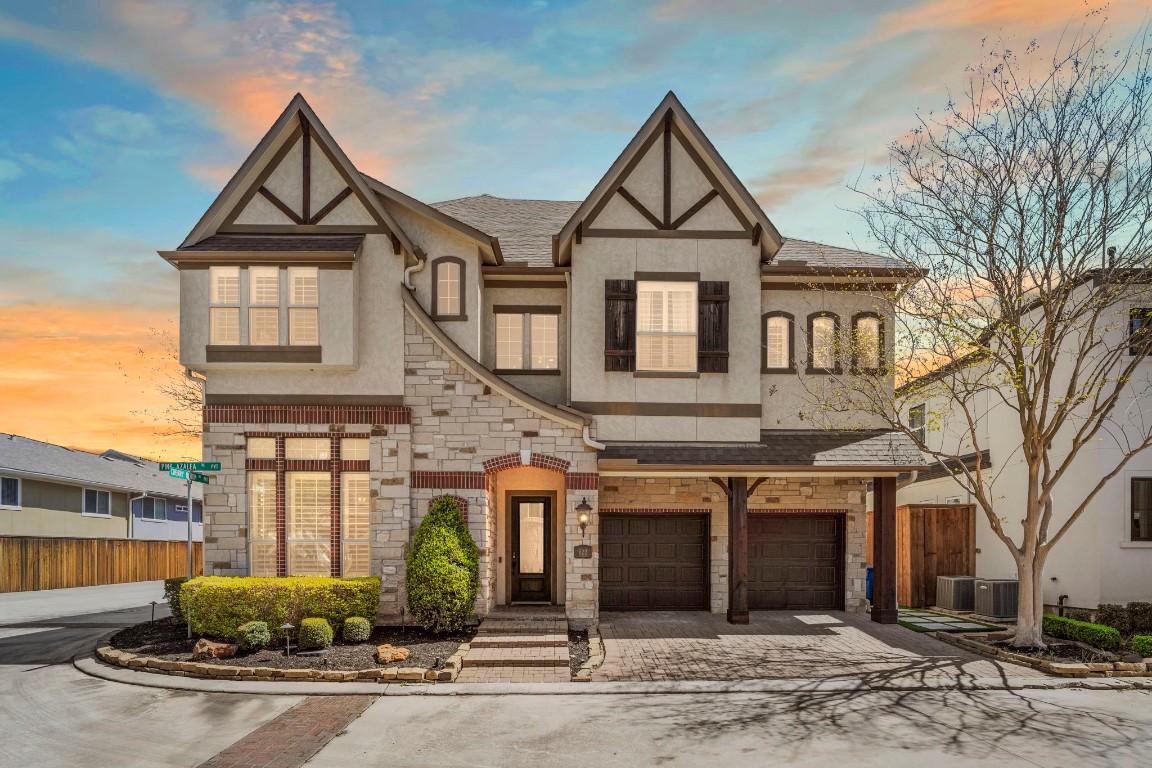 Welcome to 622 Pink Azalea Trail, where refined living meets timeless design in the heart of Memorial West.