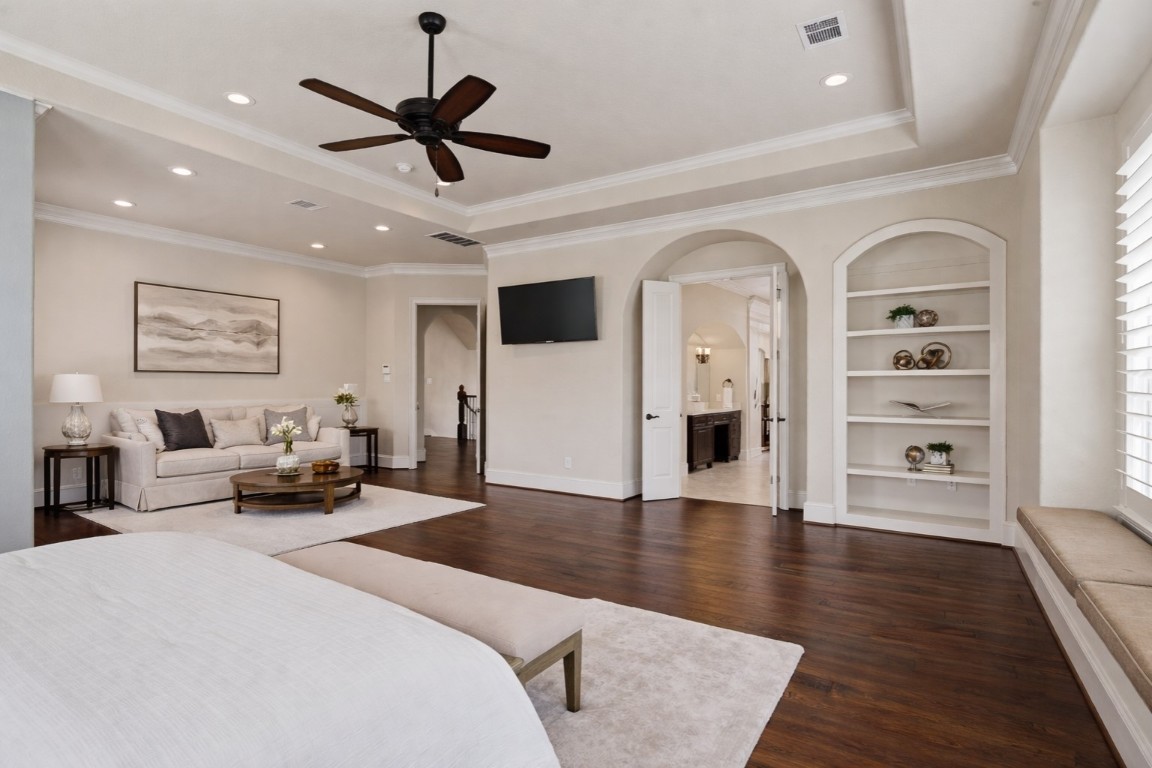 622 Pink Azalea Trail Houston, TX 77079 - Photo 22 of 50 An additional view of the primary suite highlighting its expansive proportions, private seating area, and spa-like ensuite bath.