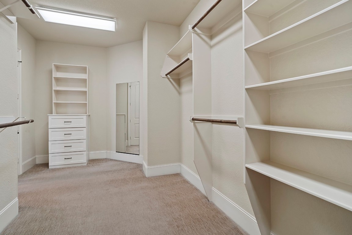 622 Pink Azalea Trail Houston, TX 77079 - Photo 31 of 50 The spacious walk-in closet provides generous storage with room for seamless organization. Additional hanging space not shown.