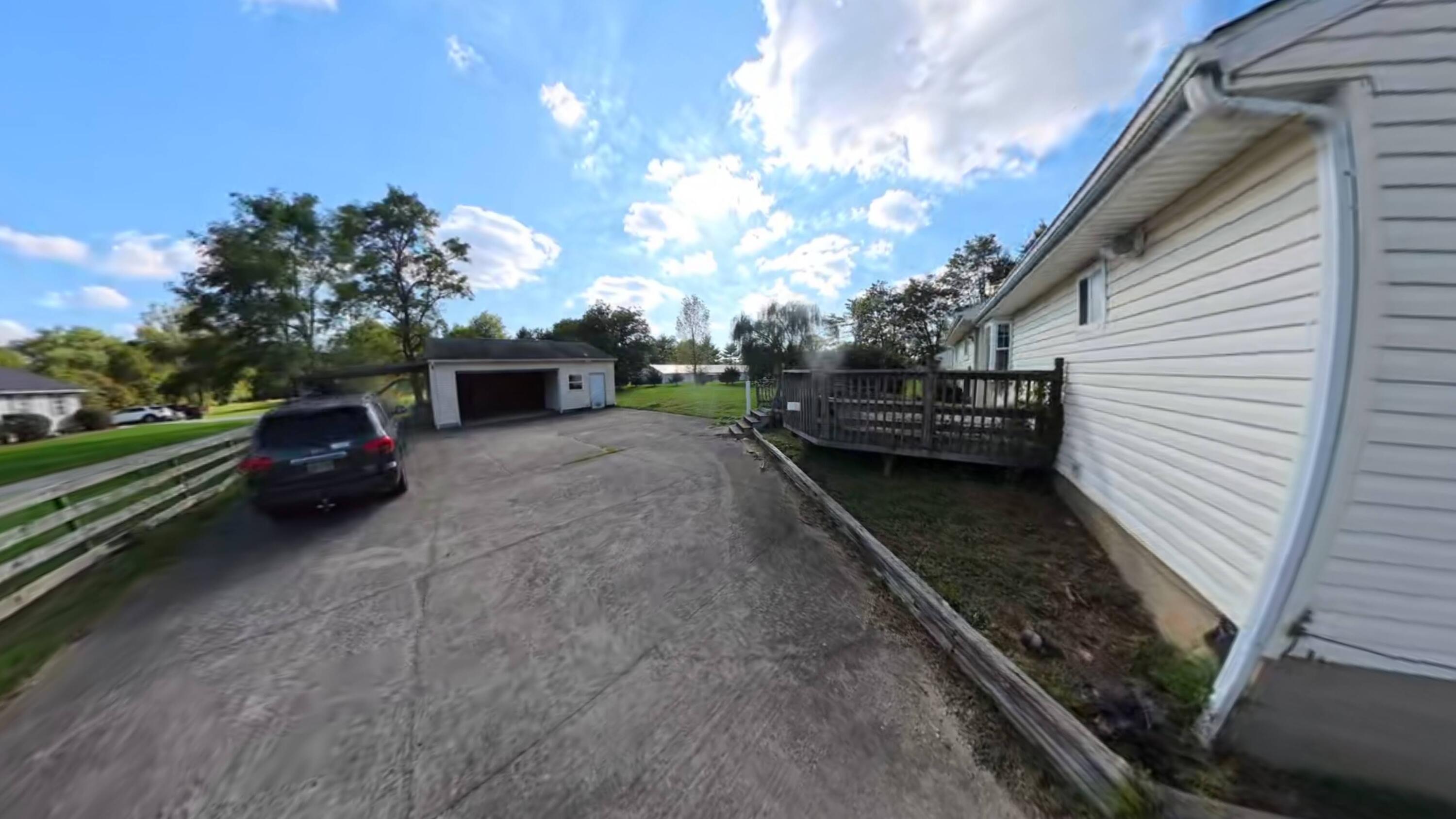 6045 Refugee Road Pickerington, OH 43147 - Photo 21 of 28 261006 09.12 z Back driveway with deck.