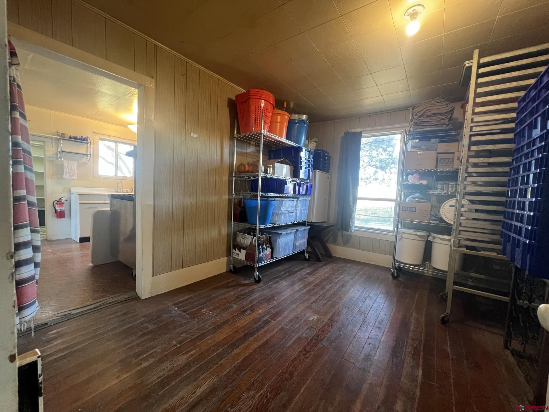12363 Road 25 Cortez, CO 81321 - Photo 13 of 26 a view of livingroom with hardwood floor and window