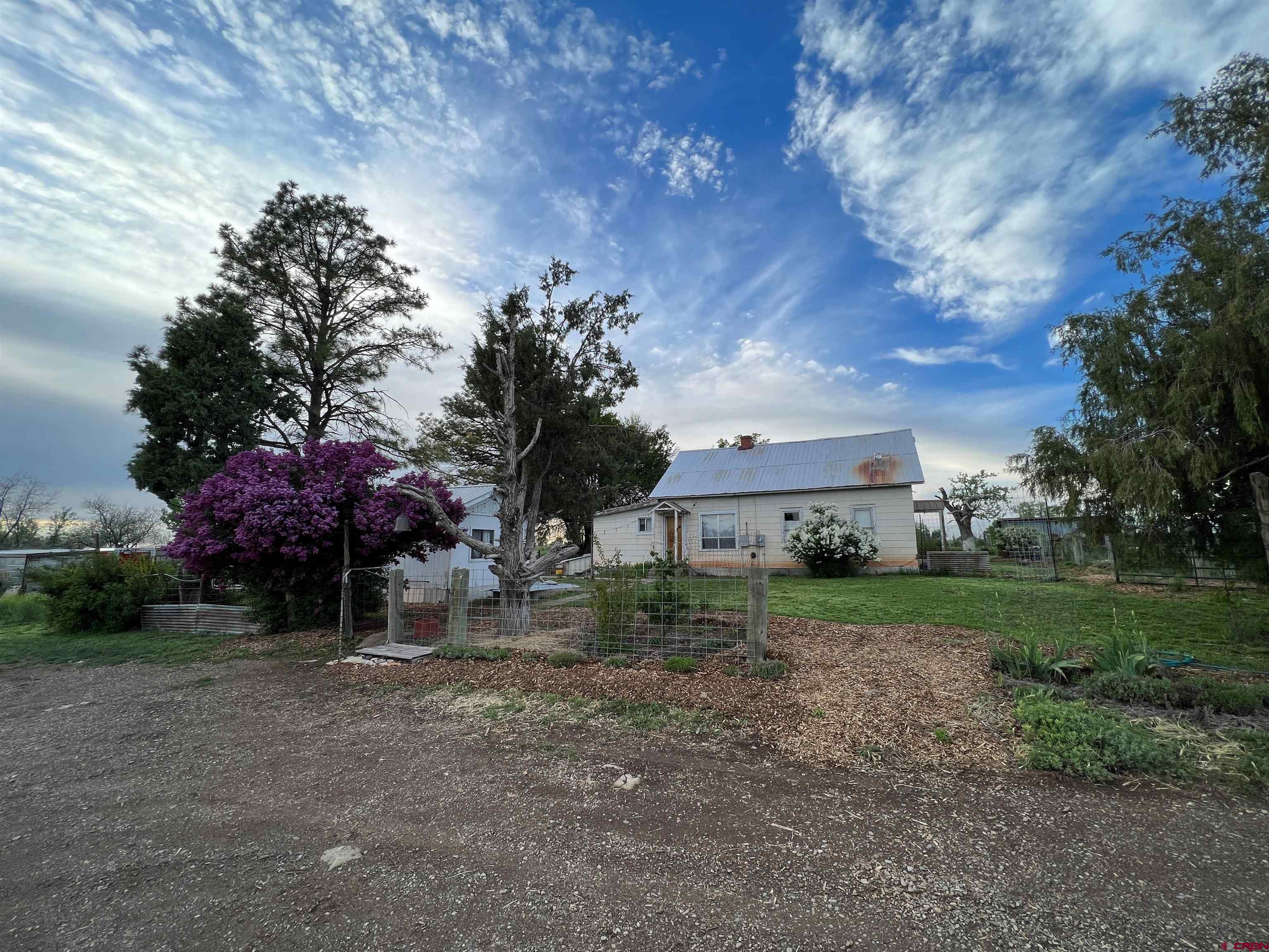 12363 Road 25 Cortez, CO 81321 - Photo 26 of 26 a view of a house with a yard