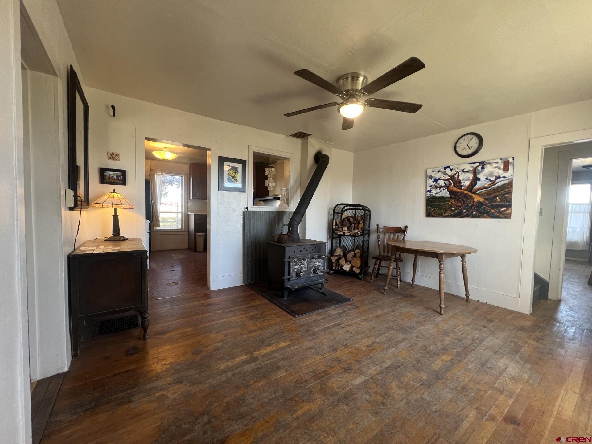 12363 Road 25 Cortez, CO 81321 - Photo 9 of 26 a view of a livingroom with furniture and a ceiling fan