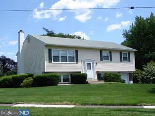 917 Longstreth Road Warminster, PA 18974 - Photo 2 of 6 a front view of a house with a yard