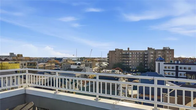 a view of a balcony with city view