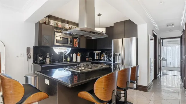 a bedroom with a bed and a table in it