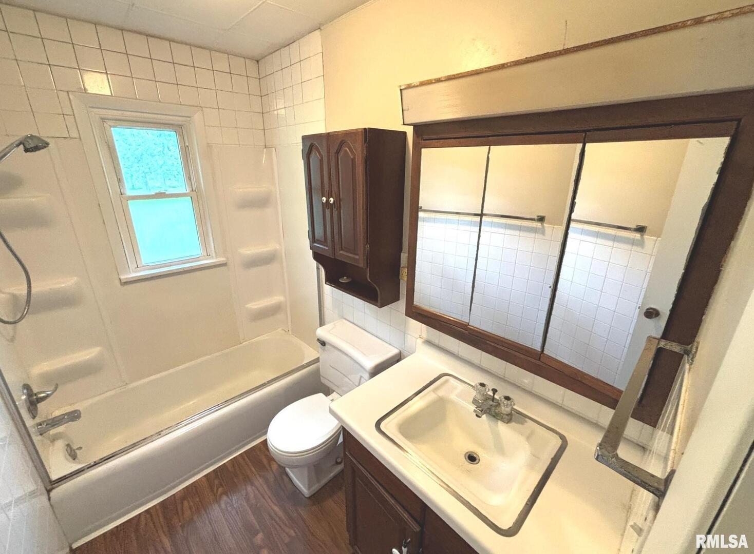 145 Hickory Grove Lane Salem, IL 62881 - Photo 18 of 20 a bathroom with a sink toilet and shower
