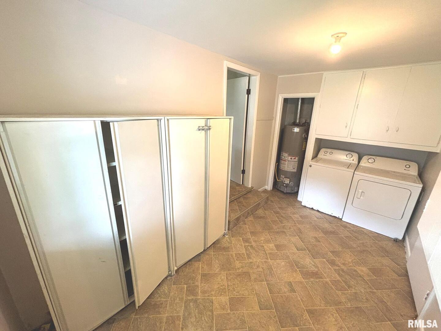 145 Hickory Grove Lane Salem, IL 62881 - Photo 10 of 20 a view of a hallway with a refrigerator