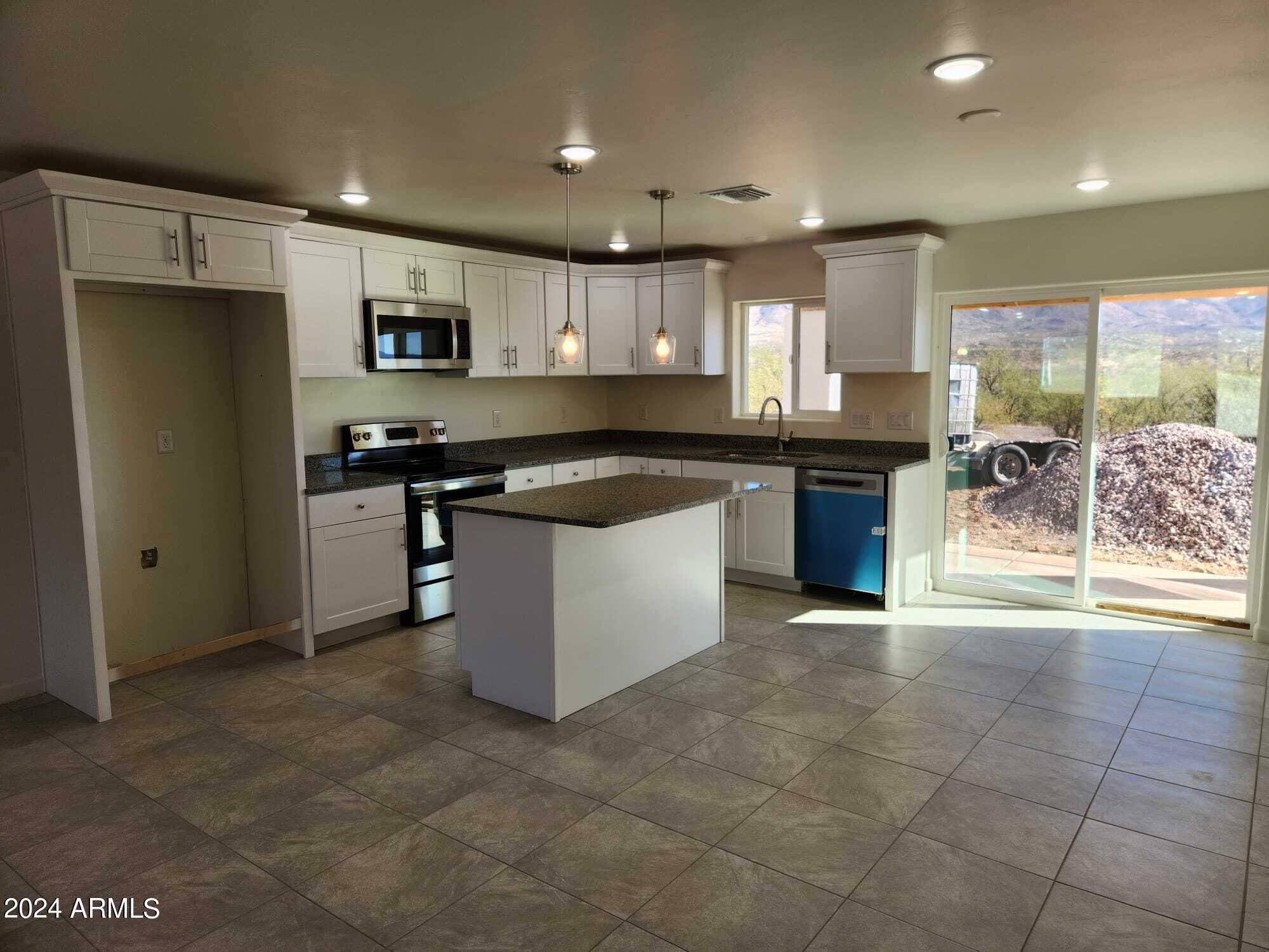 1809 Japon Court Rio Rico, AZ 85648 - Photo 5 of 13 Kitchen