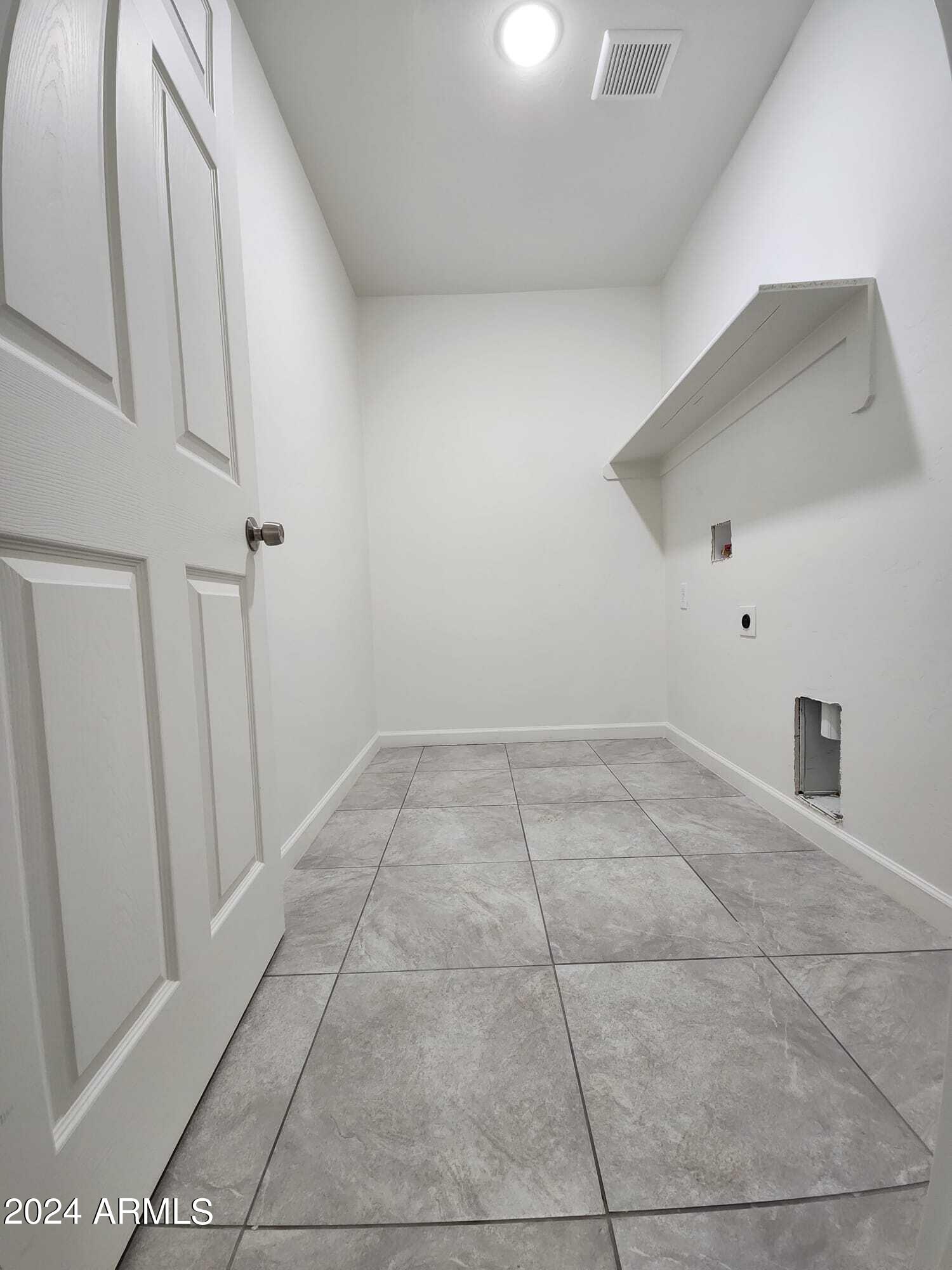 1809 Japon Court Rio Rico, AZ 85648 - Photo 10 of 13 Laundry Room