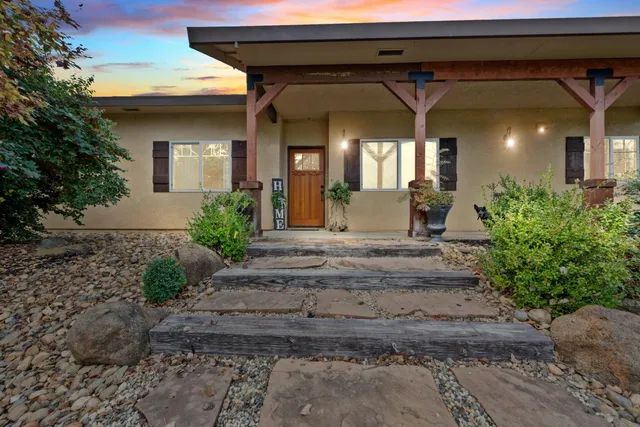 a view of a house with a porch
