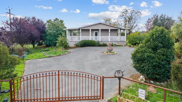 a view of a swimming pool with a table and chairs