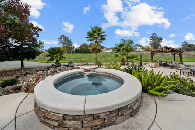 a view of living room with furniture and flat screen tv