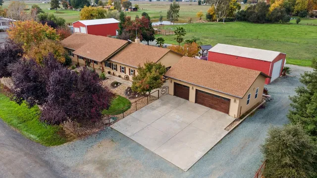 an aerial view of a house with sitting space