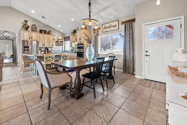 a bedroom with a bed and a lamp