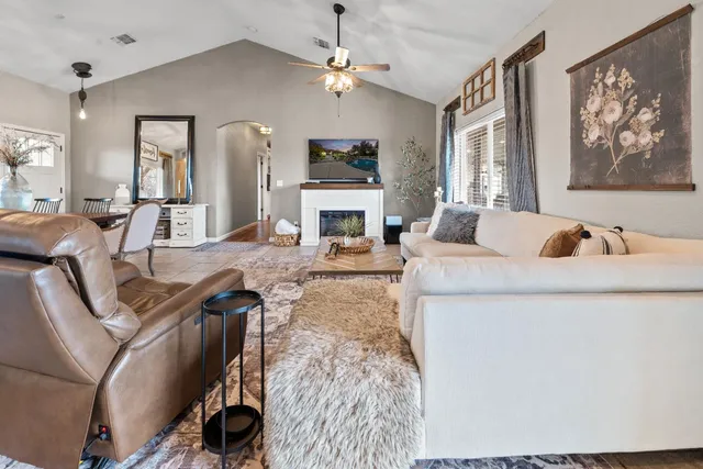 a view of a patio with a table and chairs