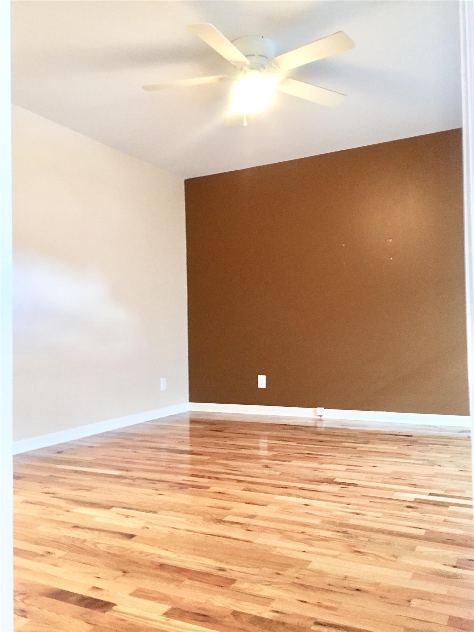 1615 Clay Street Springfield, TN 37172 - Photo 2 of 20 Spacious family room with lots of light & ceiling fan! Perfect for relaxing with family & friends!
