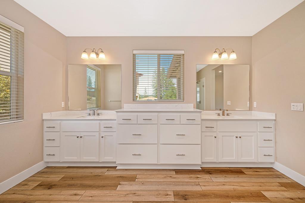504 Chase Court Colfax, CA 95713 - Photo 56 of 94 a bathroom with a sink vanity and mirror