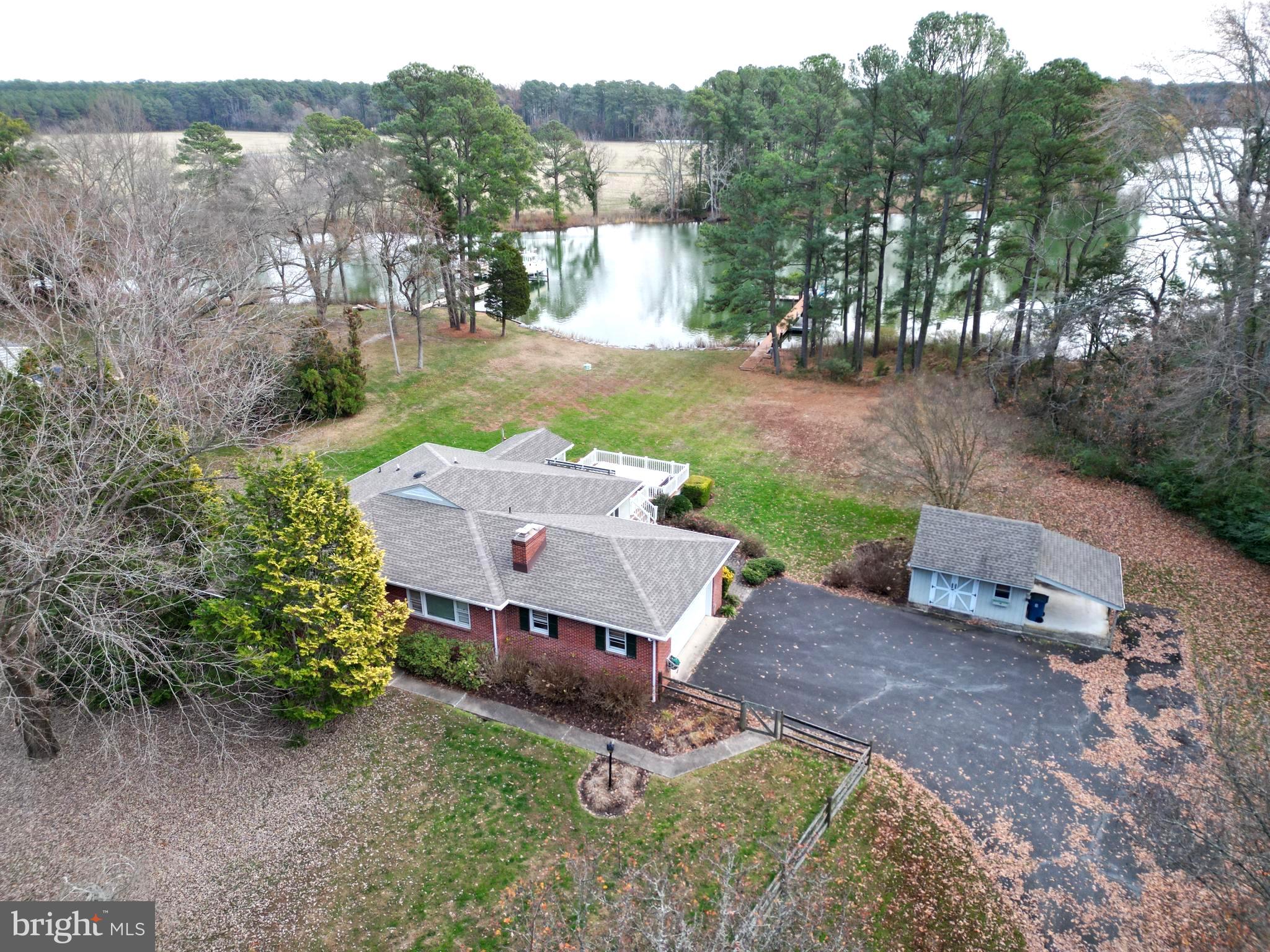 7361 Solitude Road St. Michaels, MD 21663 - Photo 4 of 23 an aerial view of a house with yard