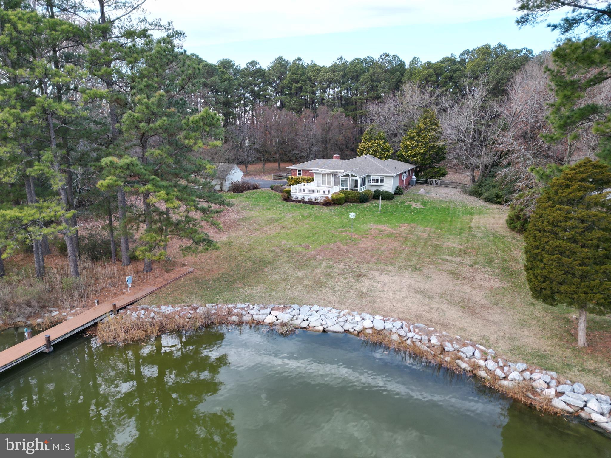 7361 Solitude Road St. Michaels, MD 21663 - Photo 8 of 23 a view of a lake with a yard