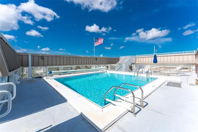 a kitchen with a table and chairs