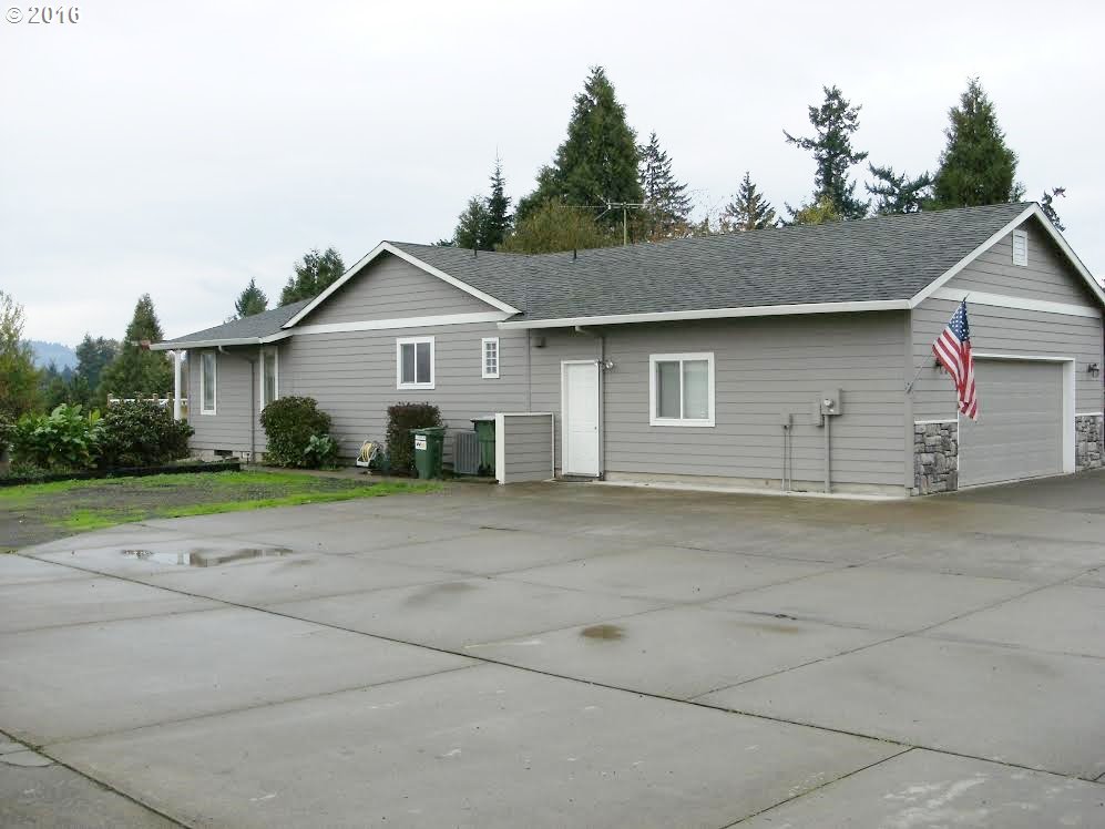8380 Northeast Dog Ridge Road Newberg, OR 97132 - Photo 3 of 32 a view of a house with a outdoor space