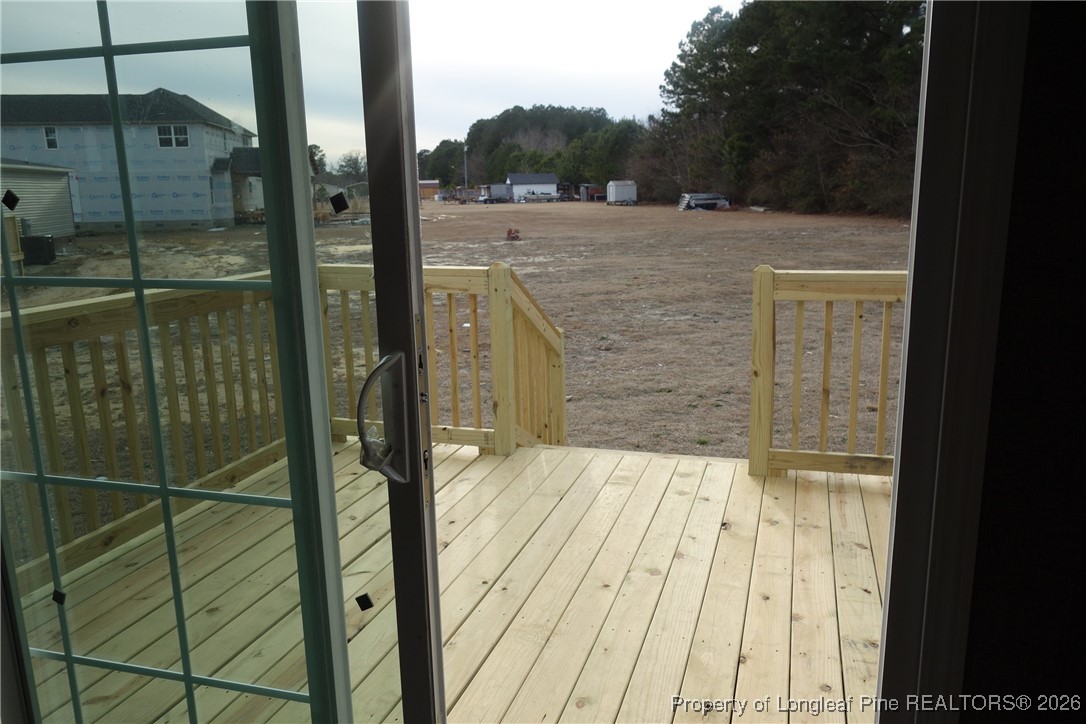 1438 Twisted Hickory Road Elizabethtown, NC 28337 - Photo 7 of 15 a view of backyard from balcony