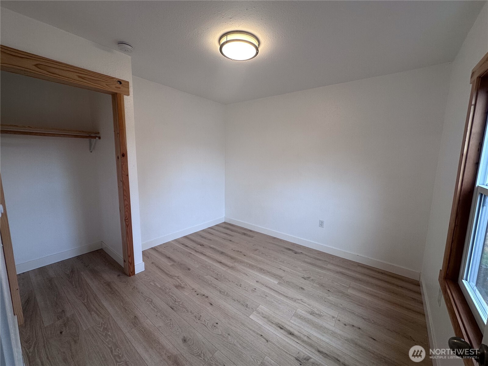 10341 184th Avenue Southwest Rochester, WA 98579 - Photo 13 of 36 a view of room with wooden floor