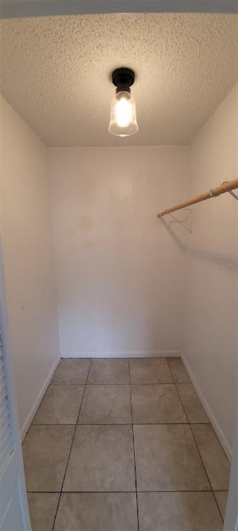 406 Wright Street Inverness, FL 34452 - Photo 21 of 38 a view of an empty room and chandelier fan