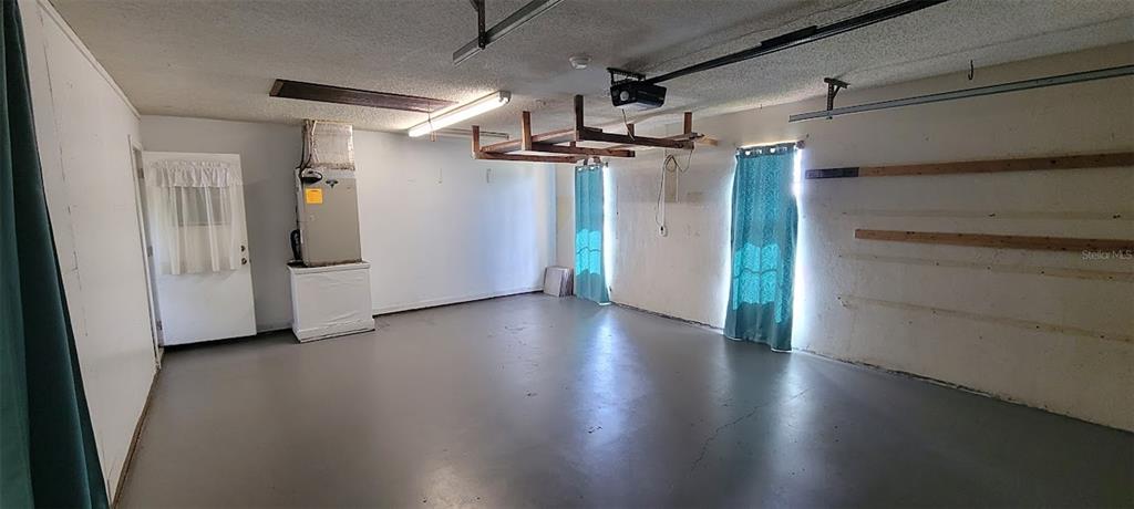 406 Wright Street Inverness, FL 34452 - Photo 38 of 38 a view of a hallway with wooden floor