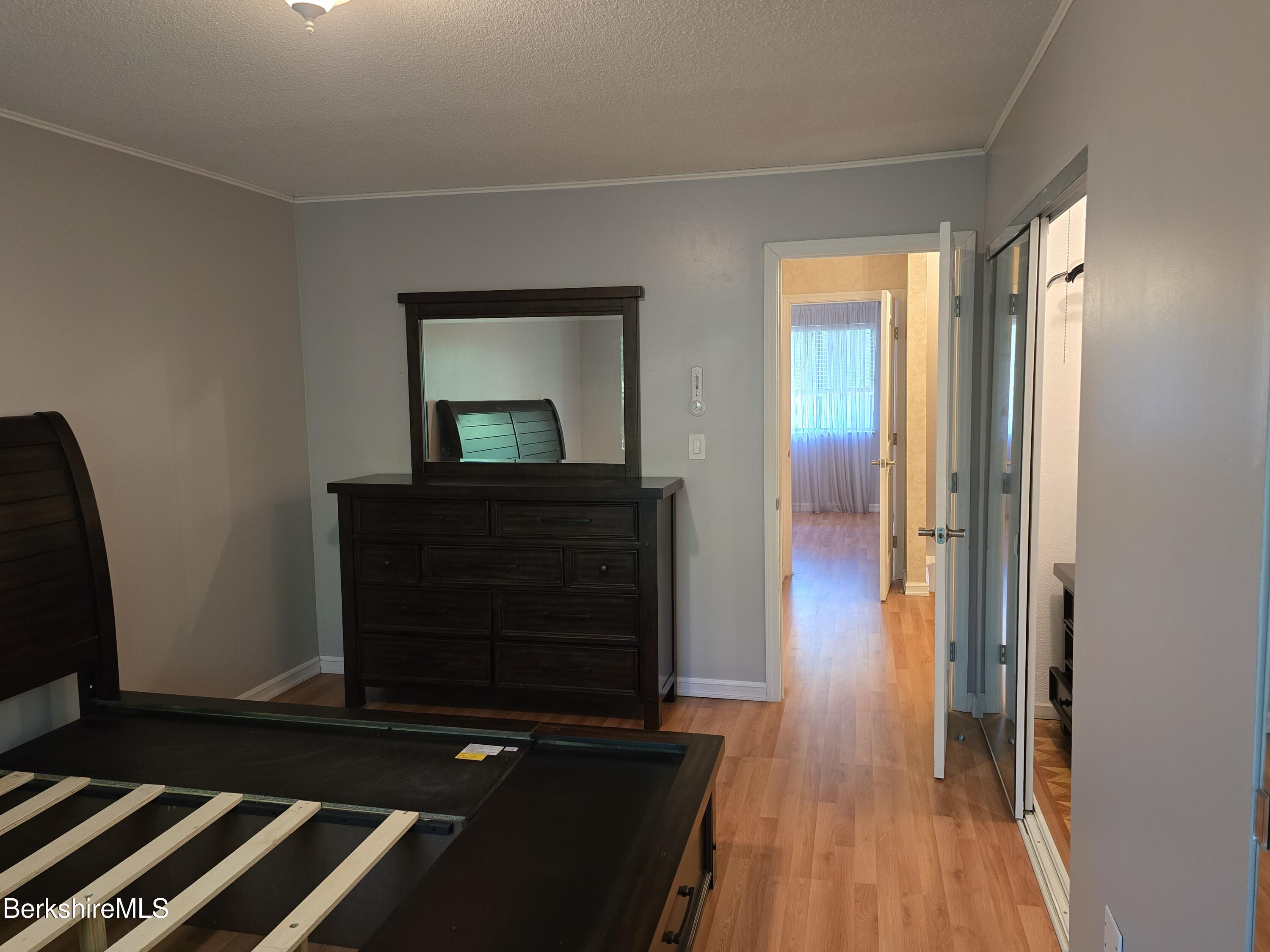 555 Russell Road, Unit J 65 Westfield, MA 01085 - Photo 12 of 20 a living room with furniture and a flat screen tv