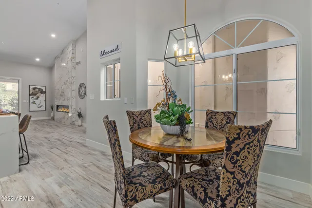 a spacious bathroom with a double vanity sink a mirror and a shower