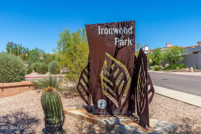 a view of backyard with outdoor seating and stairs